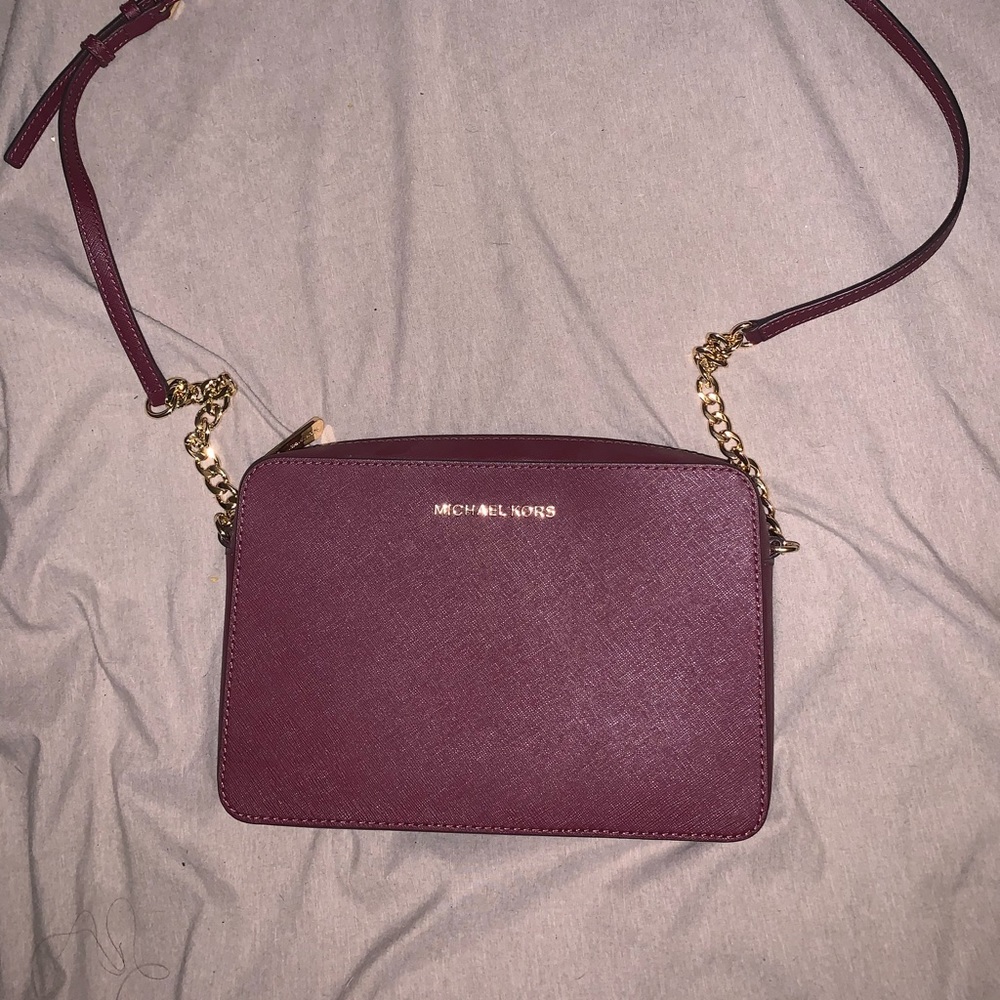 Plum purple beautiful Michael Kors side purse!